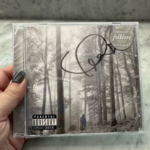 Signed and sealed Folklore CD